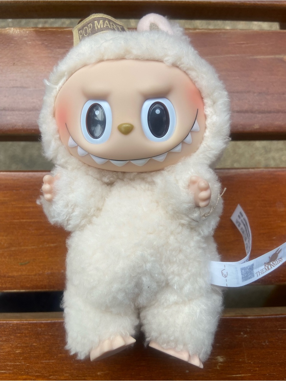 Pop Mart Labubu “Exciting Macaron” keychain in cream